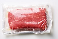 Plastic wrapping over a meat food beef pork.