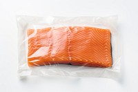 Plastic wrapping over a salmon fillet seafood white background freshness.
