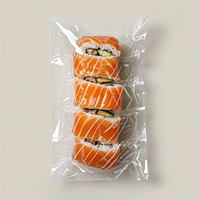 Plastic wrapping over a sushi food rice dish.