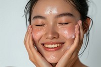 Woman cleaning her face skin adult smile.