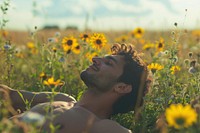 Photo of gay in flower field summer landscape sunflower.