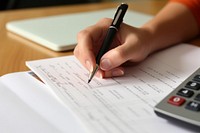 Hand doing home accounting writing pen publication. AI generated Image by rawpixel.