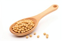 Soybeans on wooden spoon vegetable plant pill.