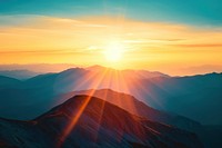 Photo of sunset behind a mountain sunlight sky backgrounds.