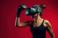 Atheletic woman weaing vr headset punching sports boxing. AI generated Image by rawpixel.