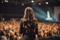 Motivational speaker audience standing female.