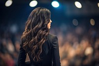 Motivational speaker audience standing female.