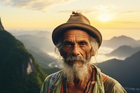 Latina brazilian senior man mountain portrait outdoors.