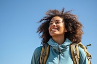 African young woman hiking backpack looking smile.