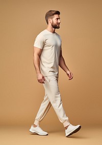 Cream t-shirt and pant  footwear standing walking.