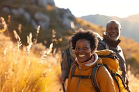 African middle age couple hiking backpacking recreation adventure.