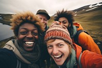 African Backpackers in iceland laughing portrait outdoors.