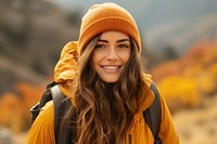 Woman hiking mountain portrait smiling.