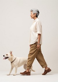 Cream shirt and pant  walking dog footwear.