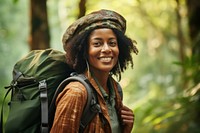African middle age woman With Backpack backpack portrait forest.