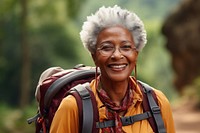African Senior woman With Backpack portrait backpack glasses.