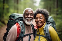 African Senior couple With Backpack backpack adventure portrait.