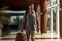 Latino younger man bag walking travel.