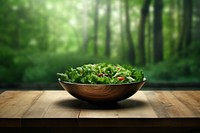 Salad bowl on empty table food tranquility vegetable. AI generated Image by rawpixel.