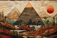 Pyramid tapestry textile craft.