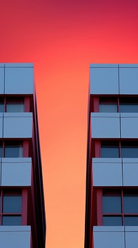 Bold color twin minimal skyscrapers architecture building outdoors.