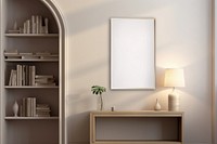 White empty framed canvas on the arch livingroom wall lamp furniture architecture.