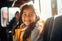 Peruvian young primary school student girl wearing uniform portrait sitting jacket.