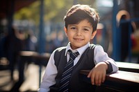 Peruvian young primary school student boy wearing uniform portrait child adult.