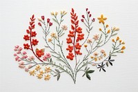 Wildflowerin embroidery style needlework textile pattern.