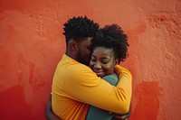Black couple hugging adult love affectionate.