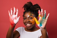 Black girl with a hand covered in paint portrait smile happy. AI generated Image by rawpixel.
