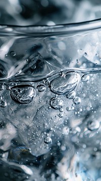 Drinking water glass ice macro photography.