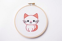 Kitten in embroidery style textile pattern cute.