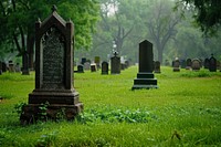 Empty cemetery tombstone outdoors grass. 