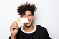 Man holding credit card smiling white background happiness.