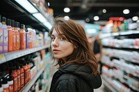 American woman supermarket buying adult.