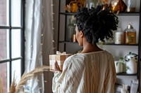 African american woman looking holding adult.