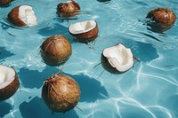 Bunch of coconuts floats plant fruit freshness. AI generated Image by rawpixel.