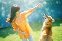 A woman taking a dog photo mammal animal motion. AI generated Image by rawpixel.