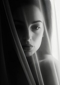 A woman in a transparent curtain photography portrait black.