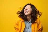 Laughing young asian woman adult joy excitement.
