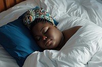 Plus size black woman sleeping blanket resting.