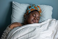 Plus size black woman sleeping blanket resting.