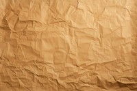 Crumpled Brown paper texture backgrounds brown.