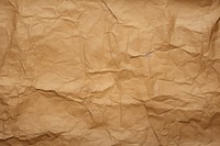 Crumpled Brown paper texture backgrounds brown.