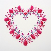 Embroidery of a heart frame pattern calligraphy celebration.