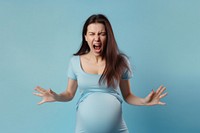 Aggressive pregnant woman shouting adult blue.