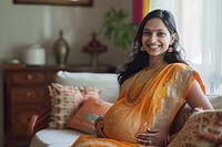 Happy pregnant woman in a living room smile hairstyle happiness.