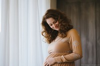 Happy Pregnant Woman is shy pregnant portrait adult.
