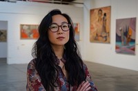 Multi ethnic art curator at gallery portrait glasses adult.
